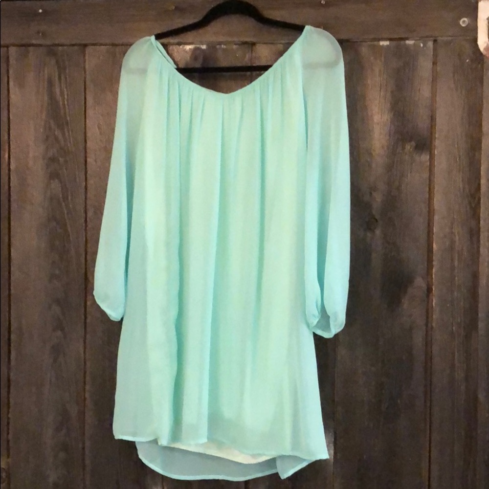 Sheer mini dress, can be belted.